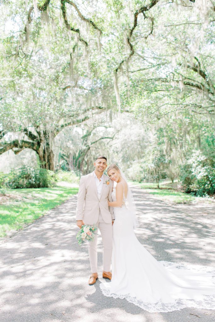 Charleston Wedding couple on avenue of oaks