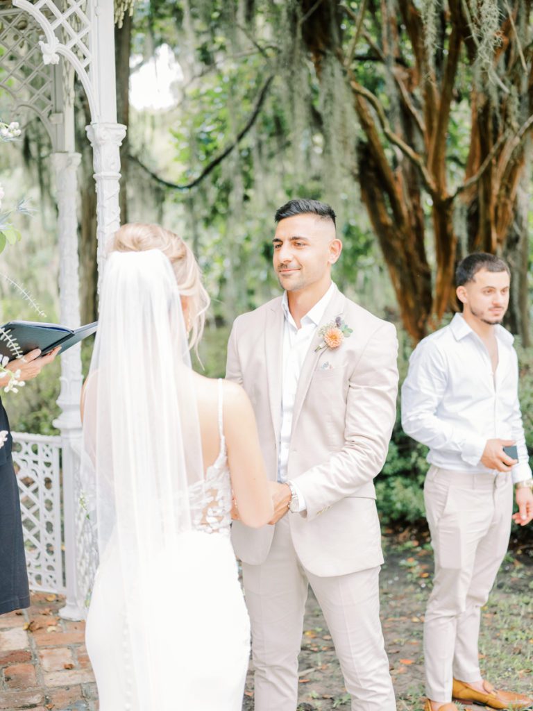 Groom looking at Bride during Wedding ceremony