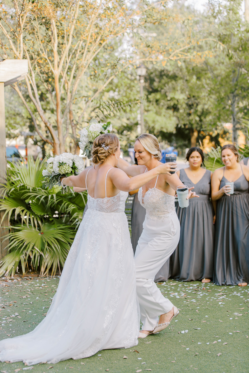 two brides celebrating after ceremony