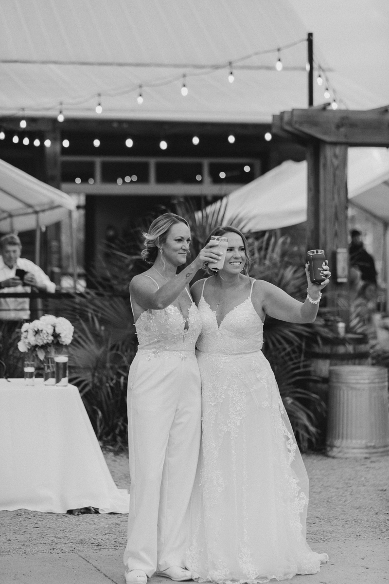 brides cheers together after toasts