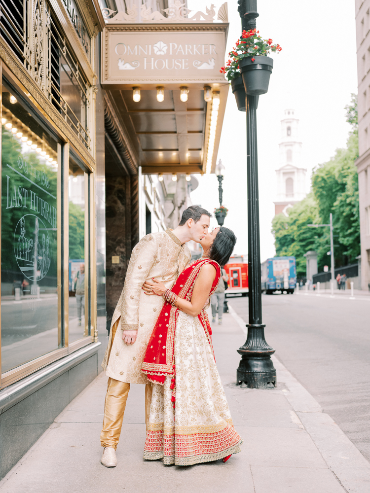 Indian Wedding Couple at Omni Parker House in Red Saree and Tan sherwani
