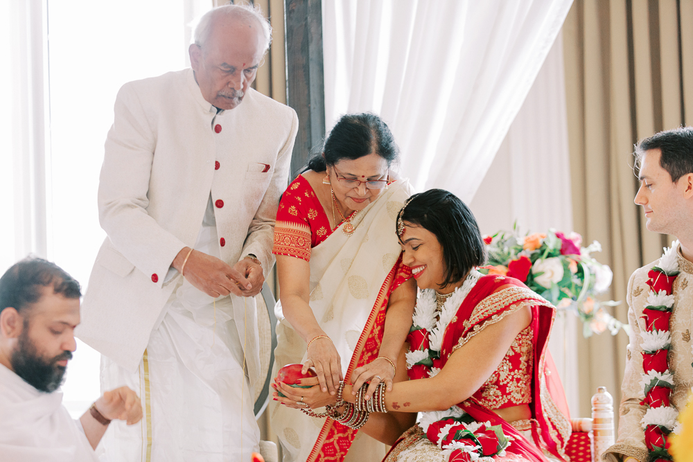 Bride with Family during Indian Wedding Ceremony