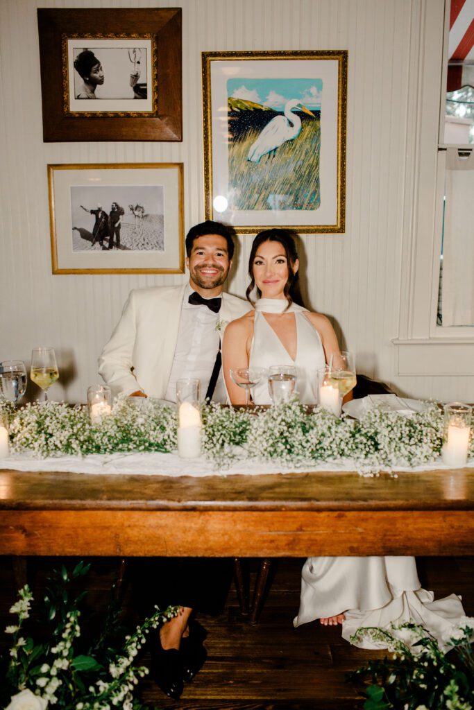 bride and groom at sweetheart table at post house inn